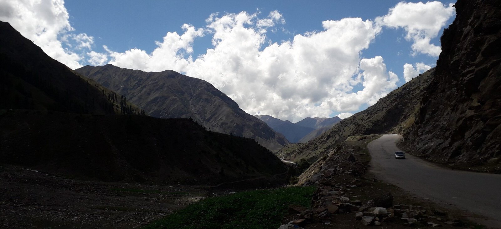 The Karakoram range, high glaciated peaks above a trekking valley