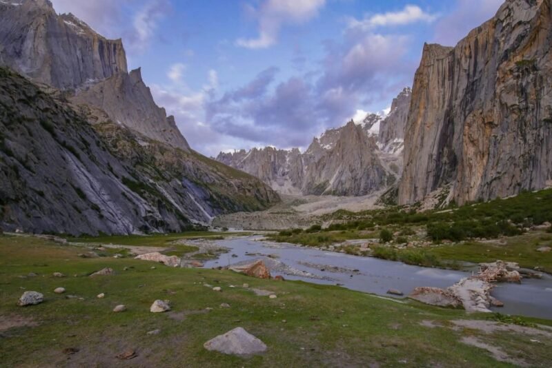 The valley floor and the stream with the towers at the head of it
