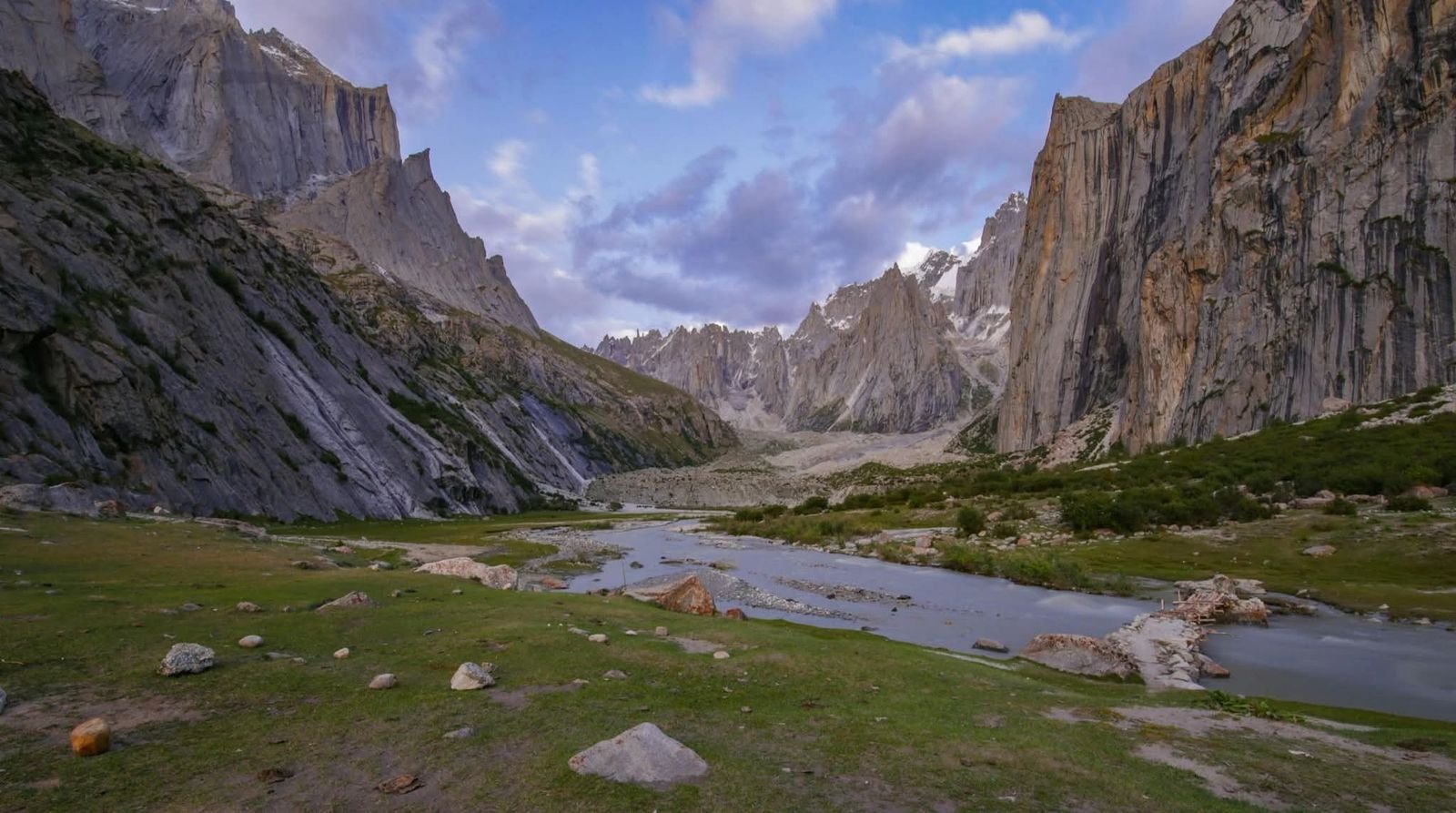 The valley floor and the stream with the towers at the head of it